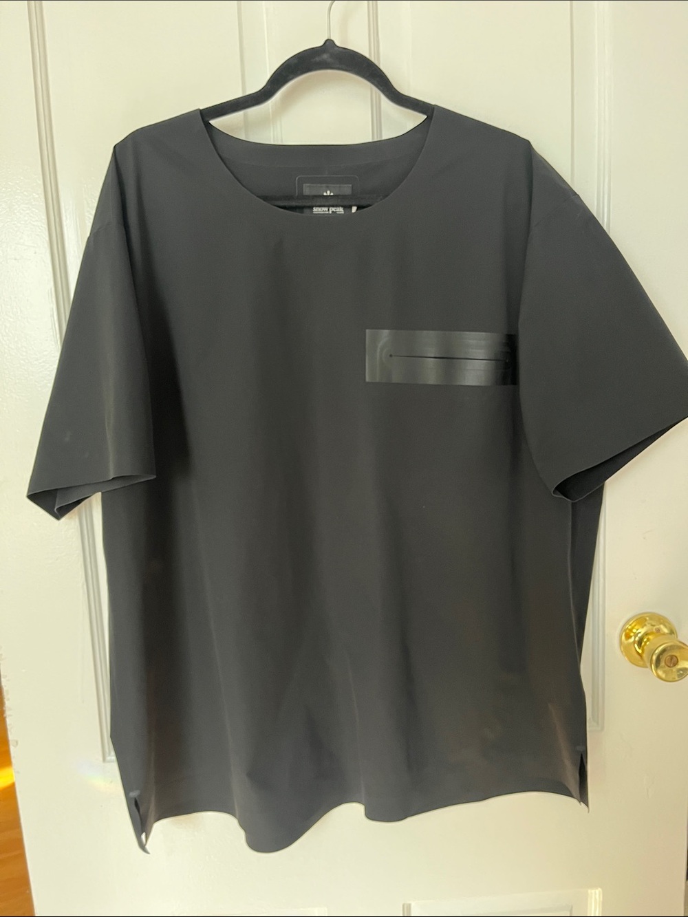 Snow Peak woven tee.